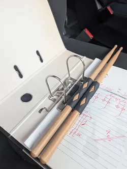 Drumstickholder for ring binder