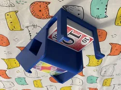 Playing card dispenser (larger size and hollowed discard pile)