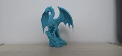 Turquoise Ancient Dragon on Rock Statue