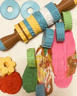 Stamp, Rattle & Roll      Modular Rolling Pin with sensory rings and sounds