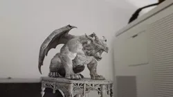 Gargoyle sitting roaring