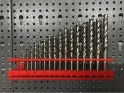 Holder for screwdrivers and drills
