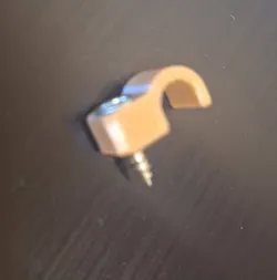 Screw in type cable clip for recessed head screws 7.5mm cable.