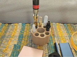Revolver style 510 thread cartridge caddy