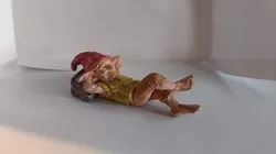 Goblin watching the clouds in the sky