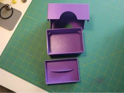 Small storage box with lid and tray.
