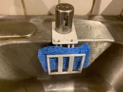 Sponge holder with dishwasher airgap mount
