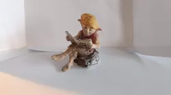 Goblin reading the newspaper