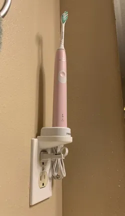 Sonicare toothbrush outlet cover holder