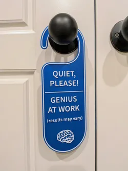 Quiet Please Genius At Work Door Hanger