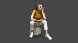 Girl in a Yellow T-shirt Sits