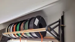 Modular filament spool rack - reversible shelf bracket