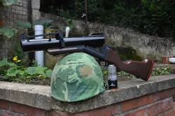 M79 Airsoft 40mm gas grenade launcher prop with KANARR CORP markings and realistic parts.