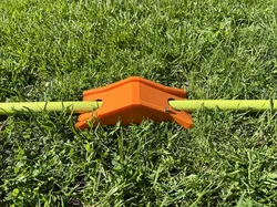 Tractor‑Style Sprinkler Shut‑Off Ramp with Lawn Anchor Hole (Fits Standard Hose Tractors)