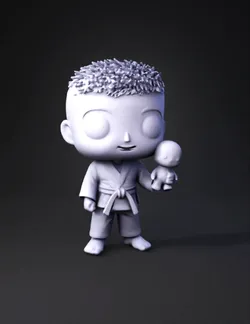 action figure holding a yellow plush toy wearing blue martial arts gi