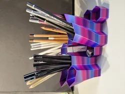 Customizable hexagonal pencil holder / organizer (OpenSCAD)