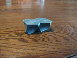 Pentagonal Scutoid that Tiles with Itself
