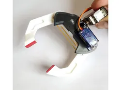 Robotic Gripper / Clamp. Two Degrees of freedom.  Servo controlled