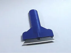 Utility blade bed scraper