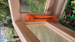 greenhouse window adjuster slide