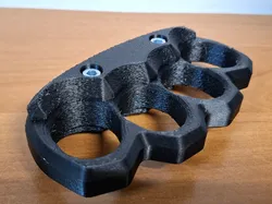 Brass knuckle, very durable.   For cracking nuts!