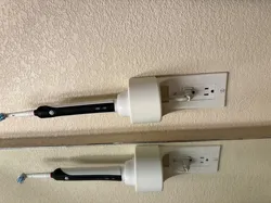 Toothbrush charger power outlet shelf