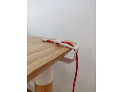 Another cable holder/cable clip.