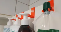 Bathroom cabinet door - hook/holder