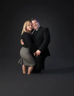 couple hugging in business attire with blurred faces