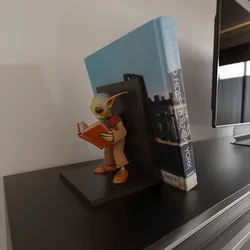 alien reading book book stand