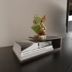 alien reading book book stand