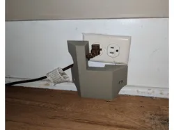 electrical outlet protector / anti-squish thing