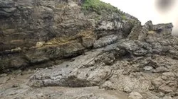 Rocky stairs at stone beach scan