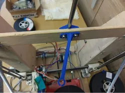 Spool holder with movable filament guide
