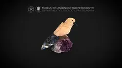 Calcite hummingbird with Sodalite on Amethyst