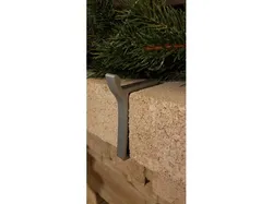 Hook for Stocking on Brick Mantle