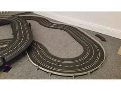 Slot track crash barrier