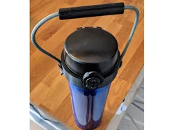 Bottle sleeve and handle for unknown water bottle