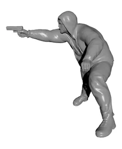 Hooded gangster man sits on motorcycle aiming a pistol with determination