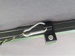 Sunshade arm fixture in case of moderate wind