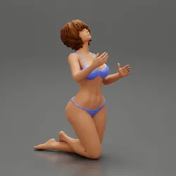 Sexy girl in bikini with short hair sitting on her knees