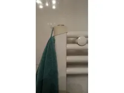 Towel hook for bathroom radiator