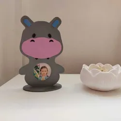 Portrait holder in the shape of a hippopotamus