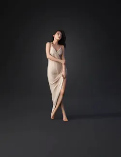 slender woman wearing a translucent beige dress with draped fabric and