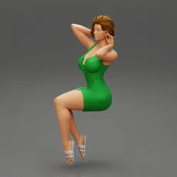 Beautiful woman sitting in short sexy dress