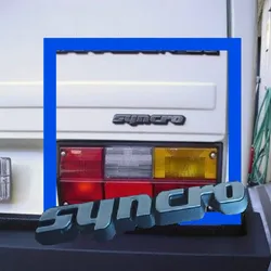 VW VOLKSWAGEN T3 SYNCRO REAR EMBLEM ANAGRAM [251 853 689 D].