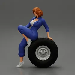 2 Models - Sexy girl mechanic in suit sitting on a truck tyre 2