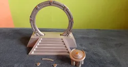 Stargate in an off-world pedestal with a DHD