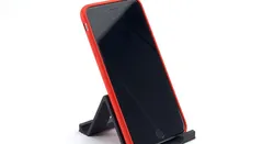 Universal symmetrical mobile device stand