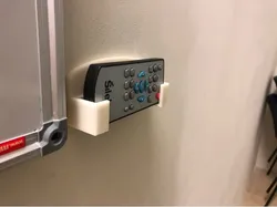 Wall mount for remote control